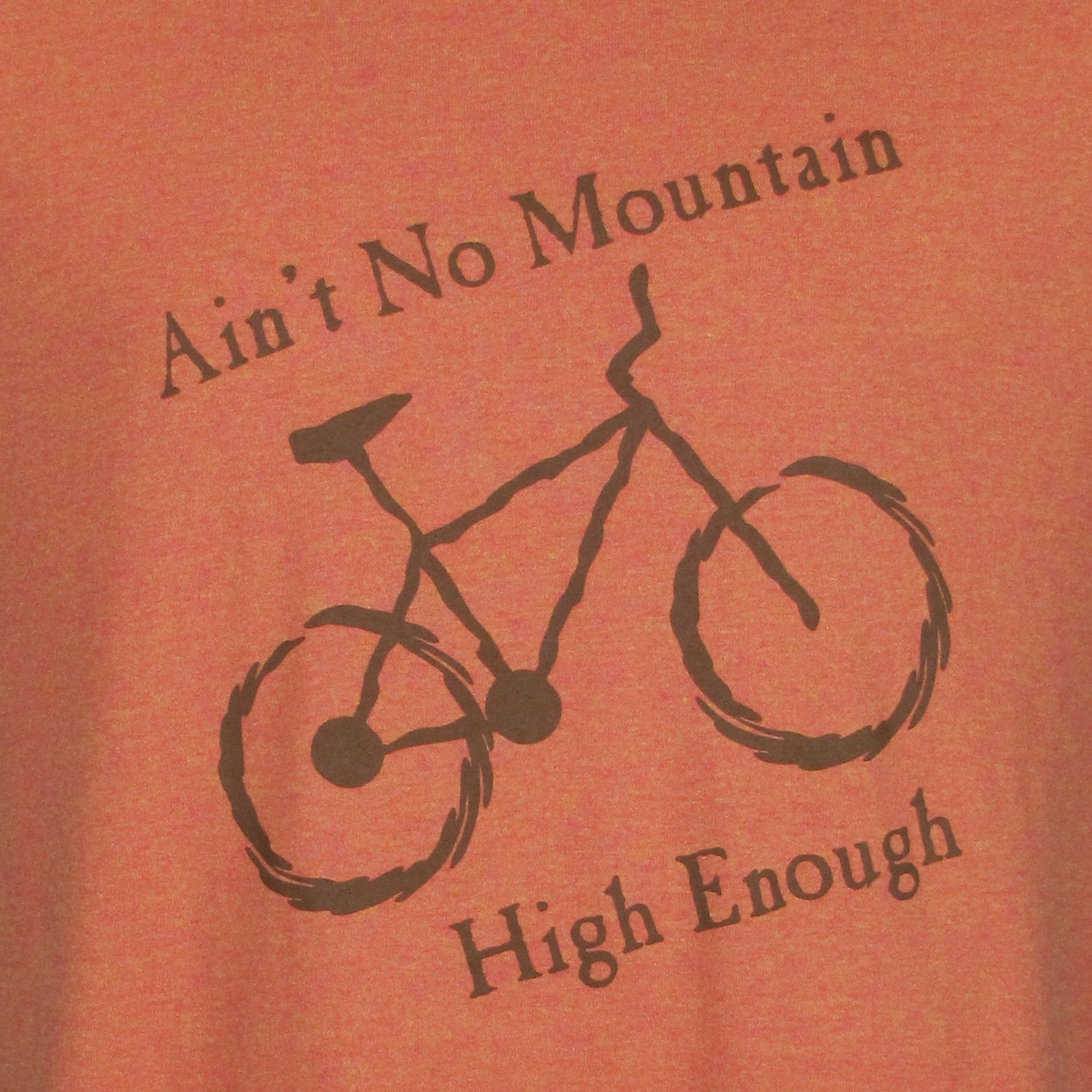 Orange t-shirt with a bicycle graphic and text 'Ain't No Mountain High Enough'