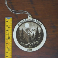 Ornament with Appalachian Trail design on a wooden surface with a ruler for scale.