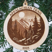 Wooden ornament with 'Appalachian Trail' engraving on a tree