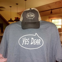 Mannequin wearing a blue t-shirt and blue cap with 'YES DEAR' text in a speech bubble.