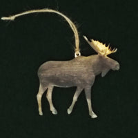 Wooden moose ornament with antlers on a black background