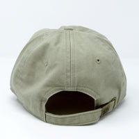 Tan baseball cap on a white background