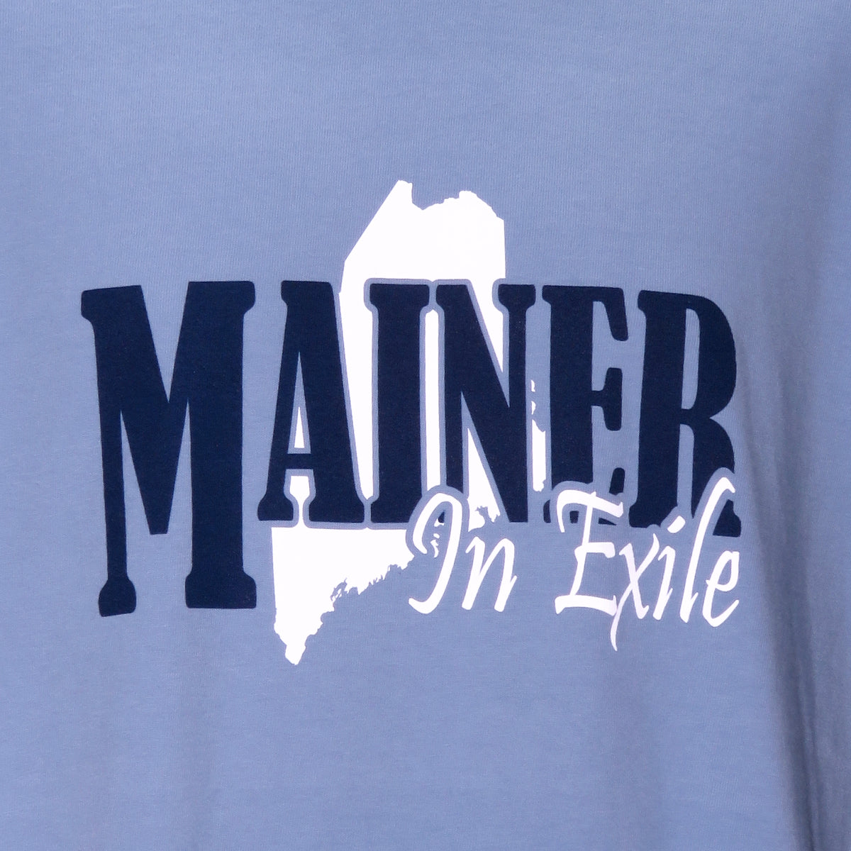 Blue t-shirt with 'MAINER In Exile' text and outline on a light blue background