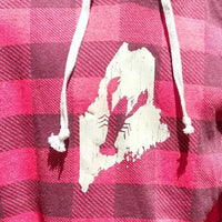 Red and black plaid fabric with a Maine lobster logo
