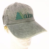 Green cap with 'Maine' and a tree logo on a white background