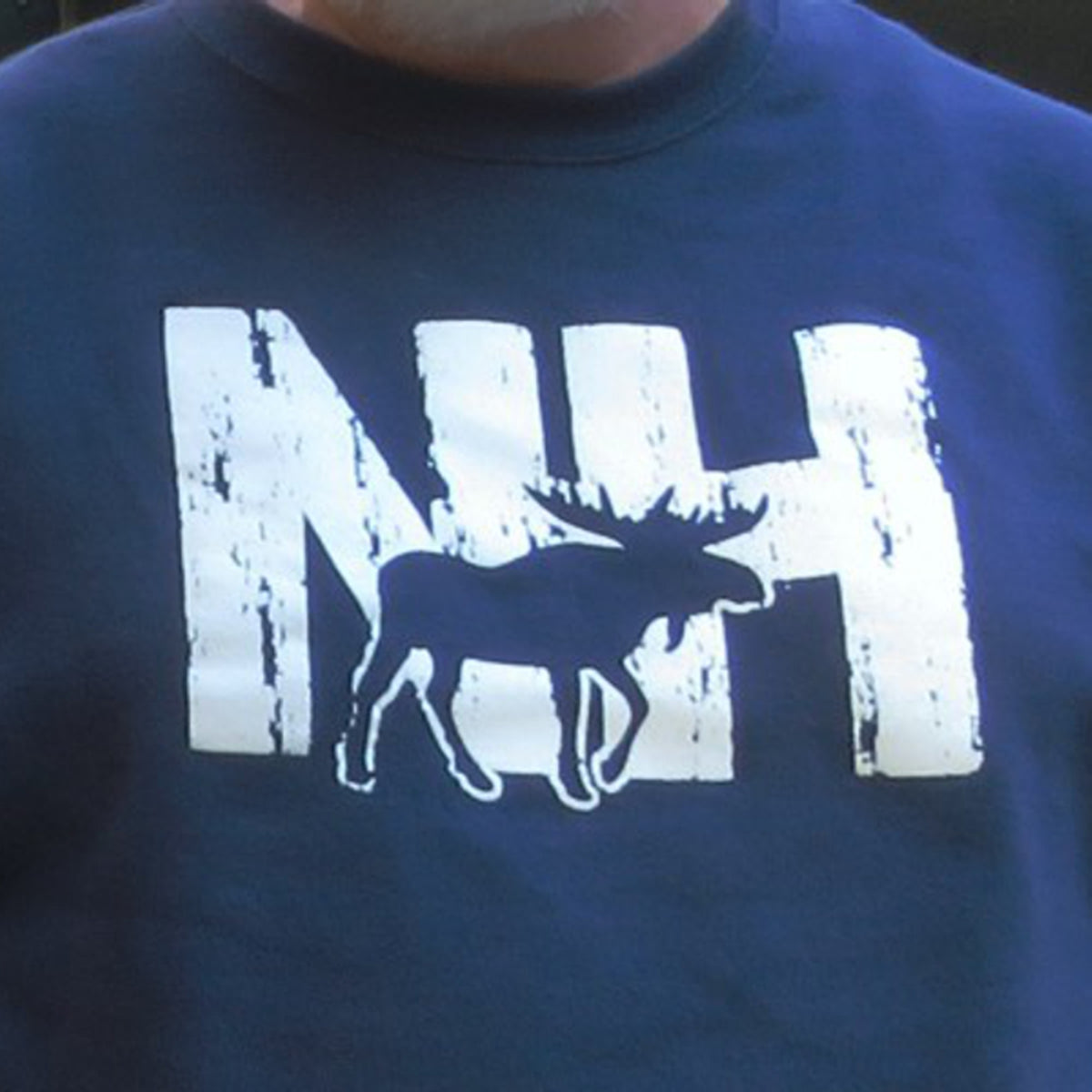 Navy blue t-shirt with white 'NH' and moose graphic